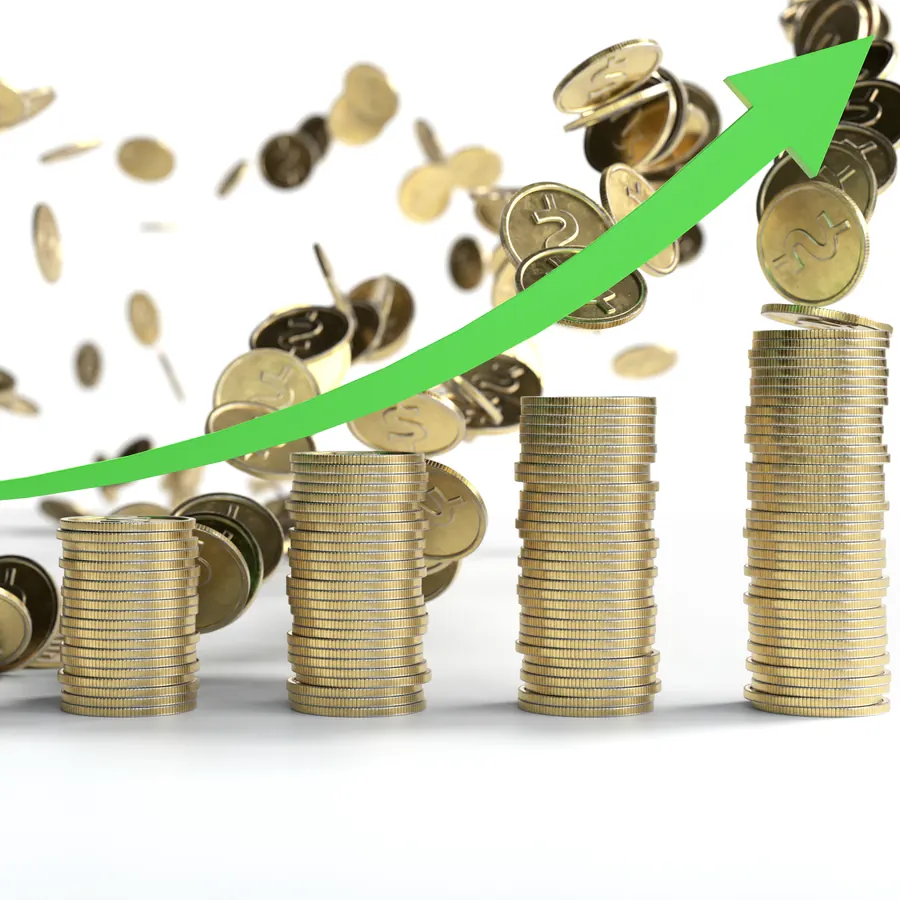 Des piles de pièces d'or croissantes surmontées d'une flèche ascendante : un potentiel économique qui se concrétise.